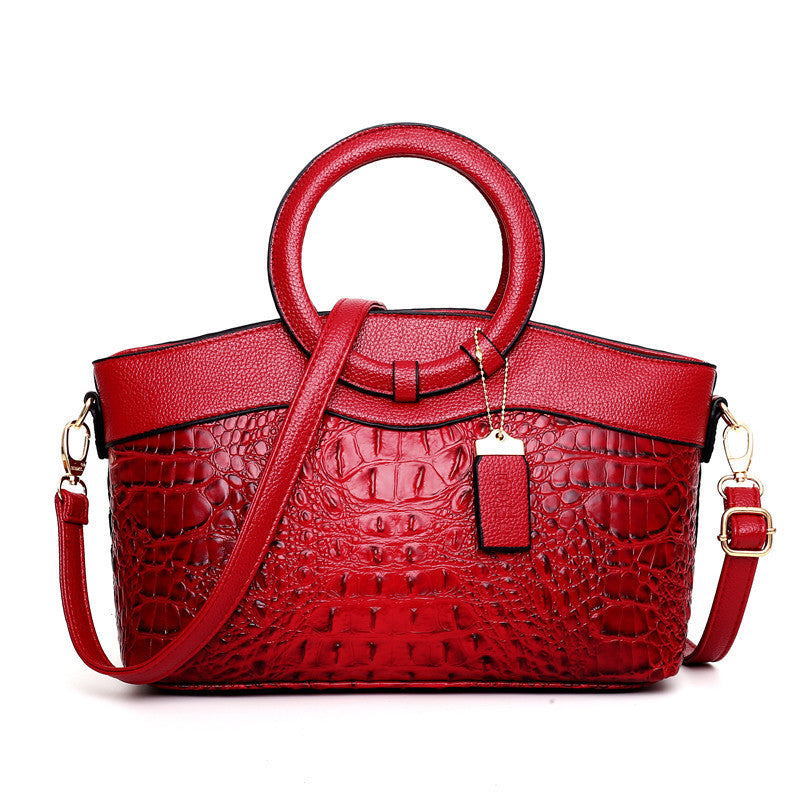 Luxe Red Croc-Embossed Handbag with Circular Handle - Bold and Elegant - Jatanele